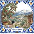 Azulejo tile showing a cherry tree and basket below the snowy Serra da Estrela, a black cat on the wall.